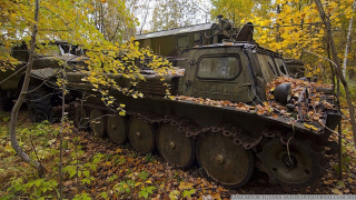 Illustration for article titled Excellent pictures of abandoned Russian military vehicles found in the woods